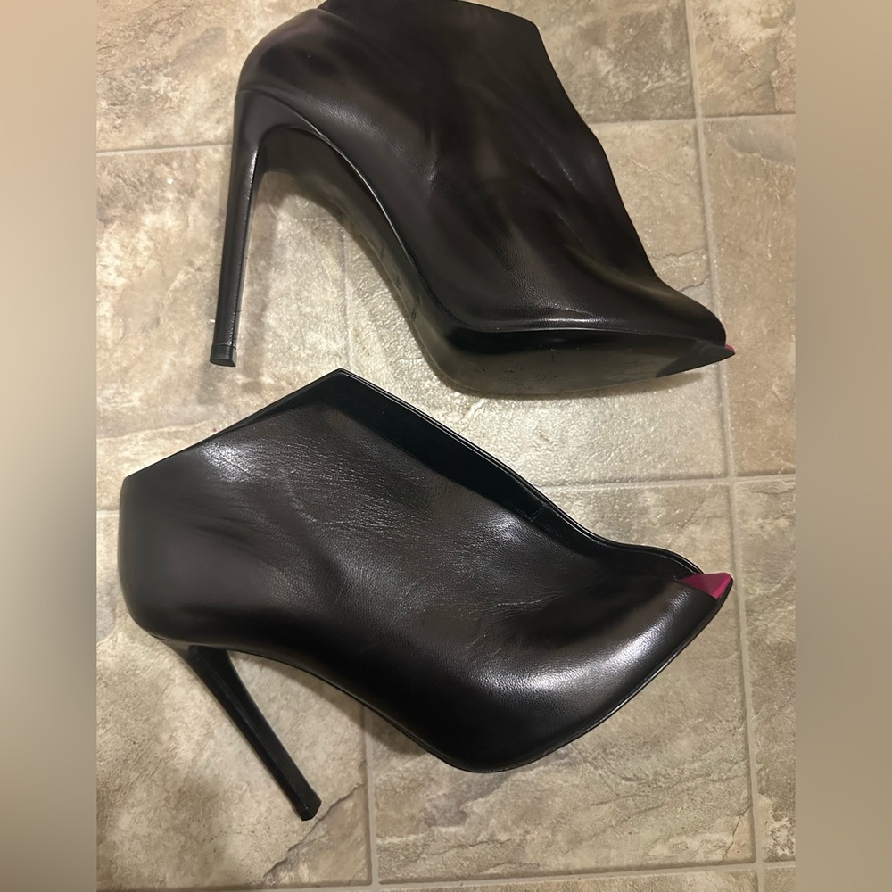 Balenciaga black heels.